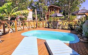 Pousada Rosa Shanti, café da manhã opcional, apenas 4 cabanas, piscina, estacionamento privativo, área de festas com churrasqueira e cervejeira, cantinho da fogueira, localizado junto a natureza